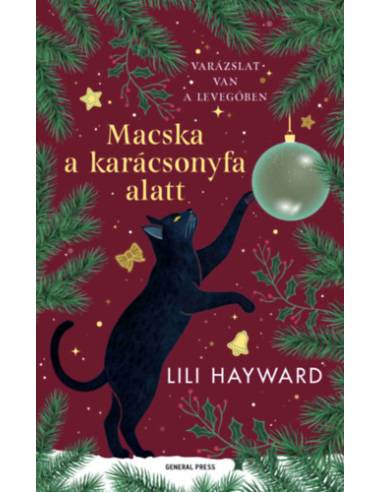 Macska a karácsonyfa alatt